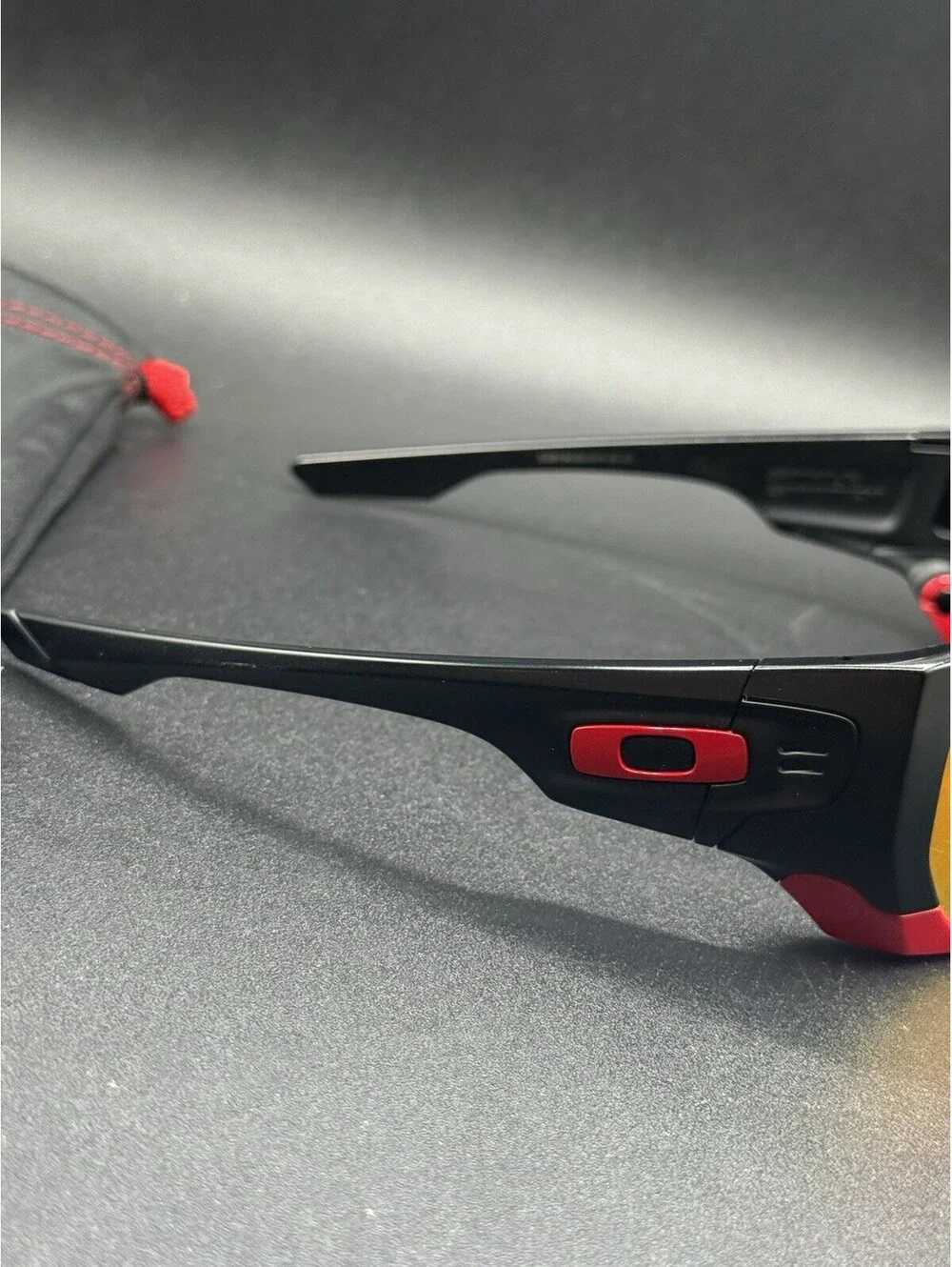 Oakley Style Switch Ferrari Matte Black/Ruby Iridium Lens OO9194-24